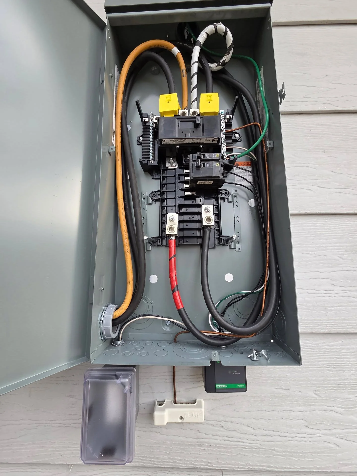 New to the 2023 NEC is the requirement to install an emergency disconnect when replacing service equipment. In this photo, the existing service conductors feed through a main breaker disconnect, to a small panel board, and finally to lugs which feed 