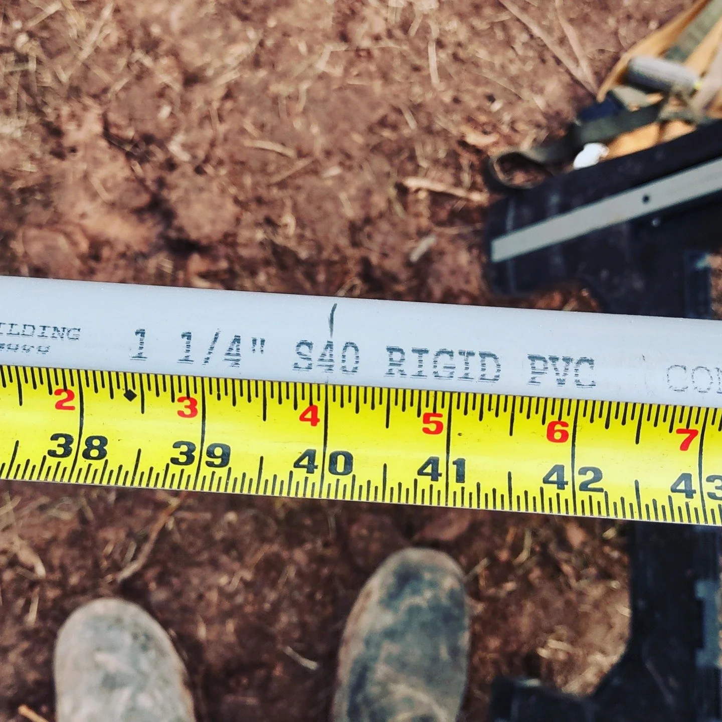 When installing conduit underground, there are important factors to consider. In this picture we see conduit labeled "S40" meaning Schedule 40. This type is meant to be buried or installed in places where it is unlikely to be damaged, as op