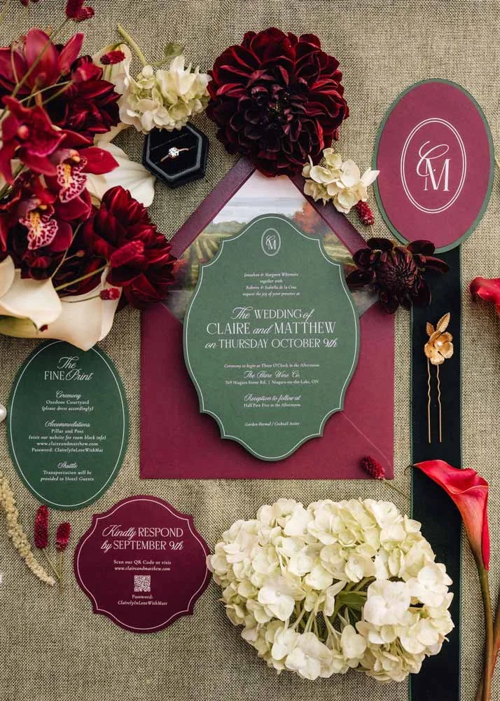 Die Cut Wedding Invitation Suites with Vintage Shapes, Ovals, Bold Burguny and Deep Greens surrounded by florals