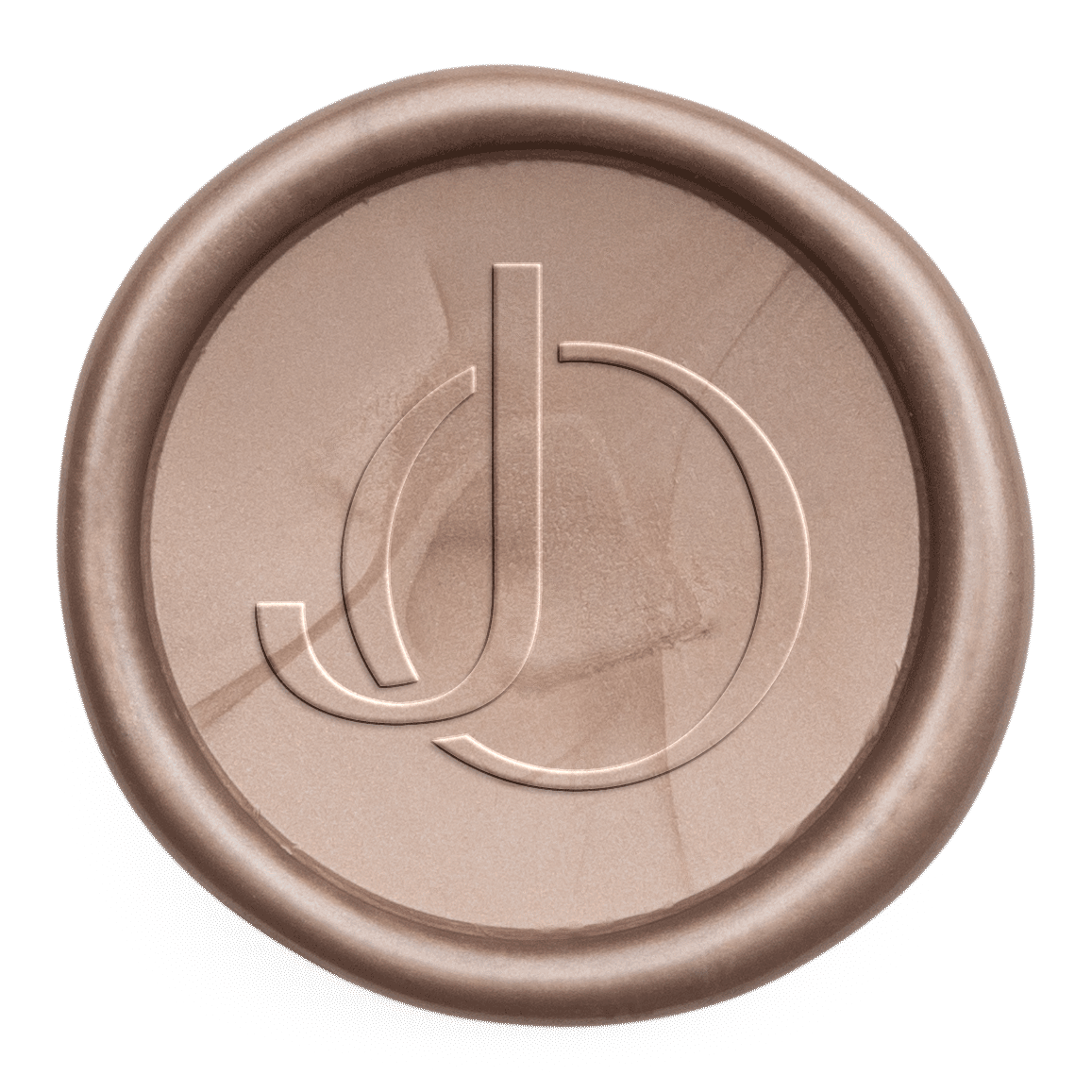 Close-up of a circular bronze or copper-colored coin with a minimalist logo embossed in the center, consisting of a stylized lowercase 'j' and 'd' intertwined.