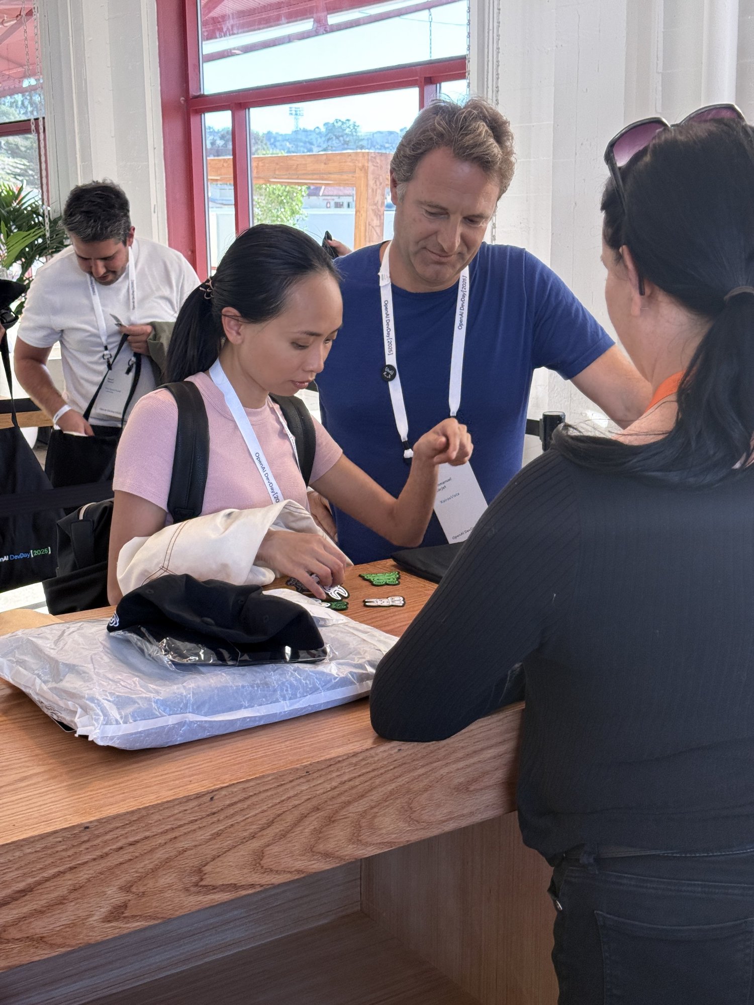 Guests personalize merchandise at an event.