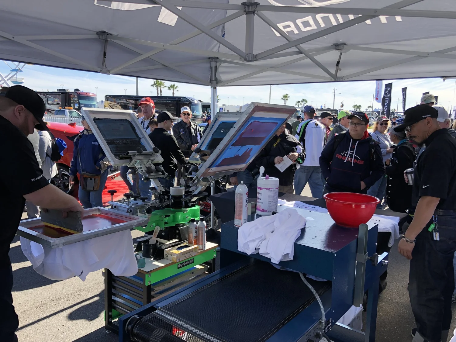 Merch Troop printing live in front of an event crowd.