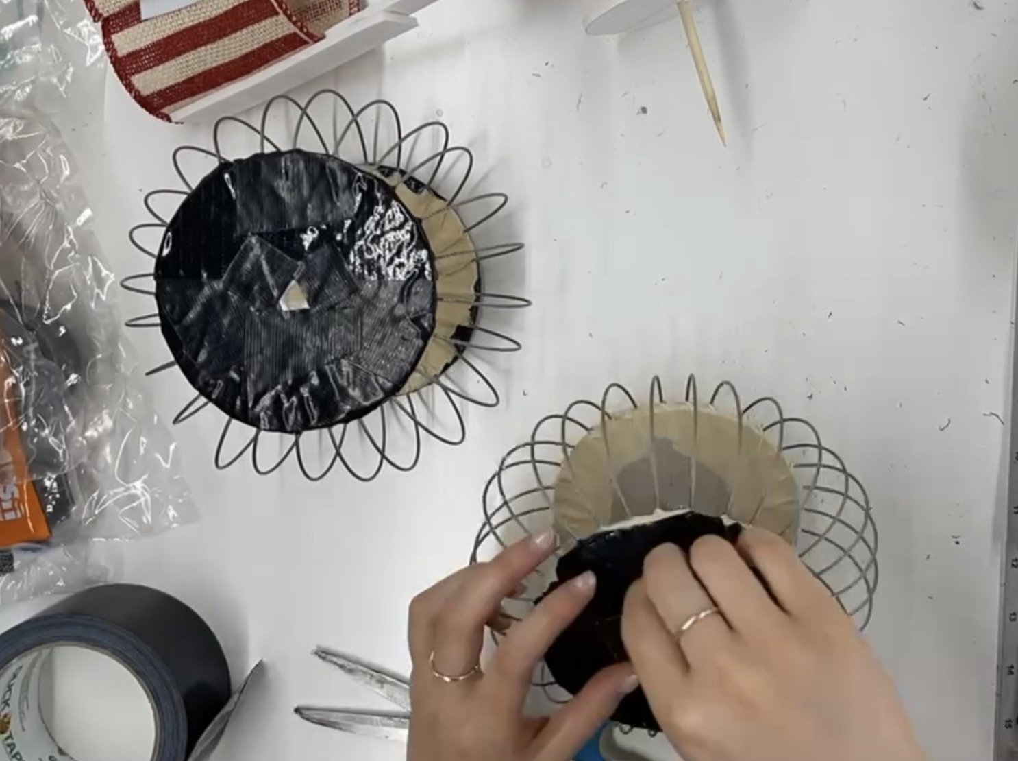 3. I wrapped a stronger tape around the circle surfaces to secure their attachment to the wires. This also ensured that any sharp wire edges did not hurt the dog using the prosthetic.