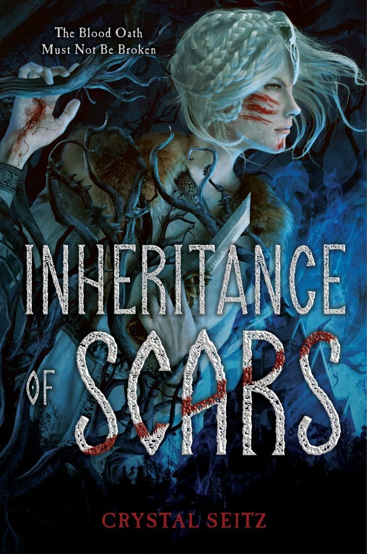 Book cover for "Inheritance of Scars" by Crystal Seitz. Features a side profile of a woman with platinum blonde braided hair, with red scars on her face and a subtle smile. Dark, twisted tree branches surround her, and she wears a fur collar. The background is dark with blue and black tones, with mist and shadows. The title and author's name are displayed prominently.