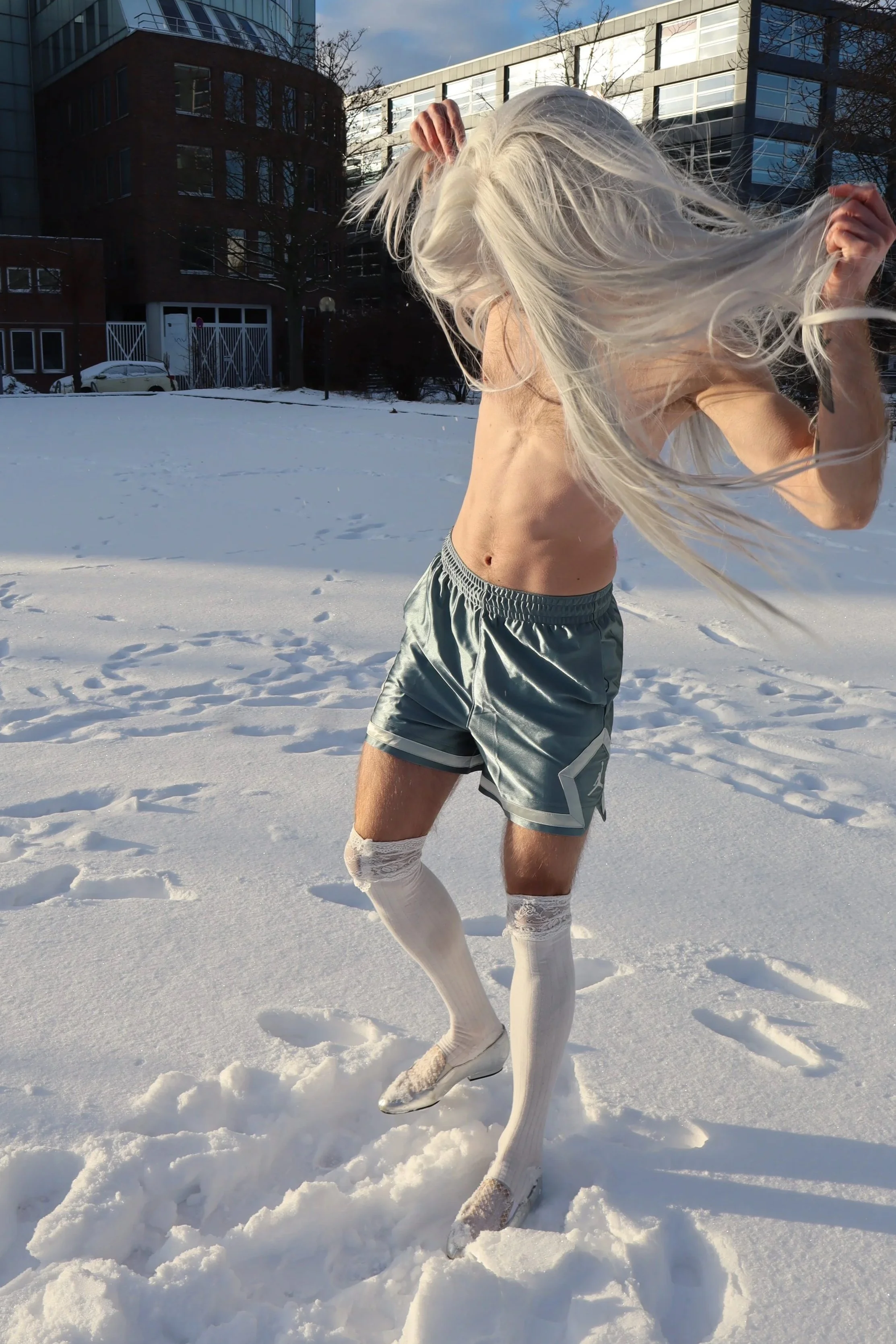 Ave Vanilla- Contemporary Artist Berlin. Artist as contemporary body art performance in snow movement.