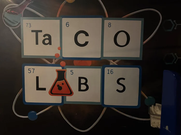 Taco Labs periodic-table wall sign