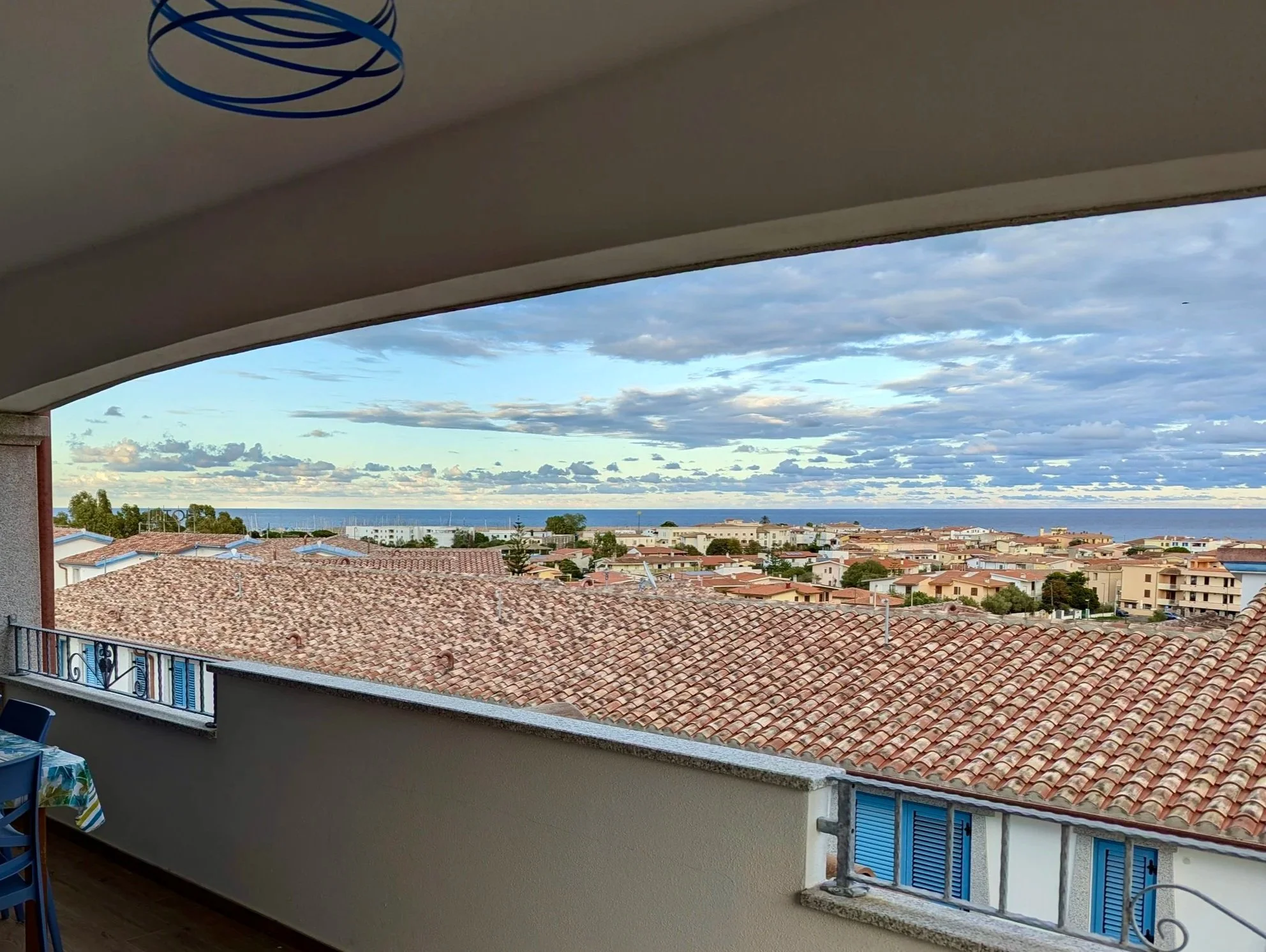 Step out onto your expansive private balcony and soak in the breathtaking 180-degree panorama. Crystal-clear waters, a picturesque coastline, and the charming town of La Caletta create a picture-perfect backdrop for relaxation and unforgettable memor