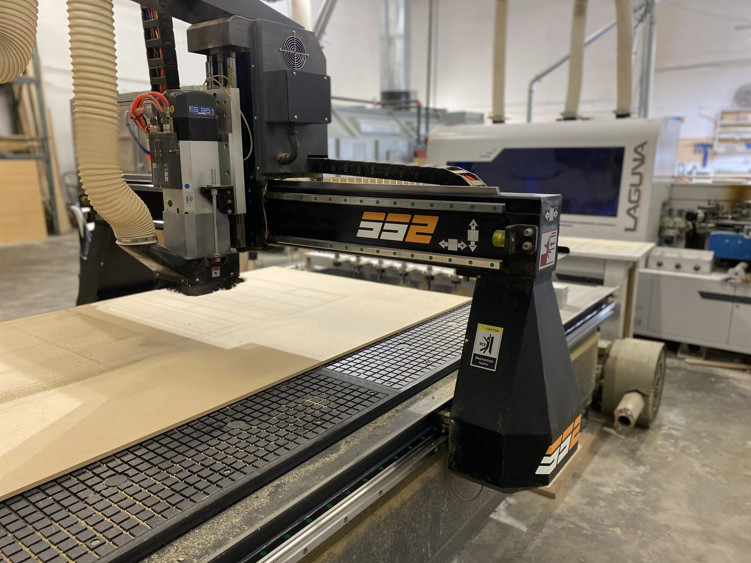 Our Laguna CNC router processes sheet goods into perfectly sized cabinet parts, ready for joinery and finishing. CAD/CAM files drive the cuts, giving you consistent fit, faster turnarounds, and crisp, clean edges.
