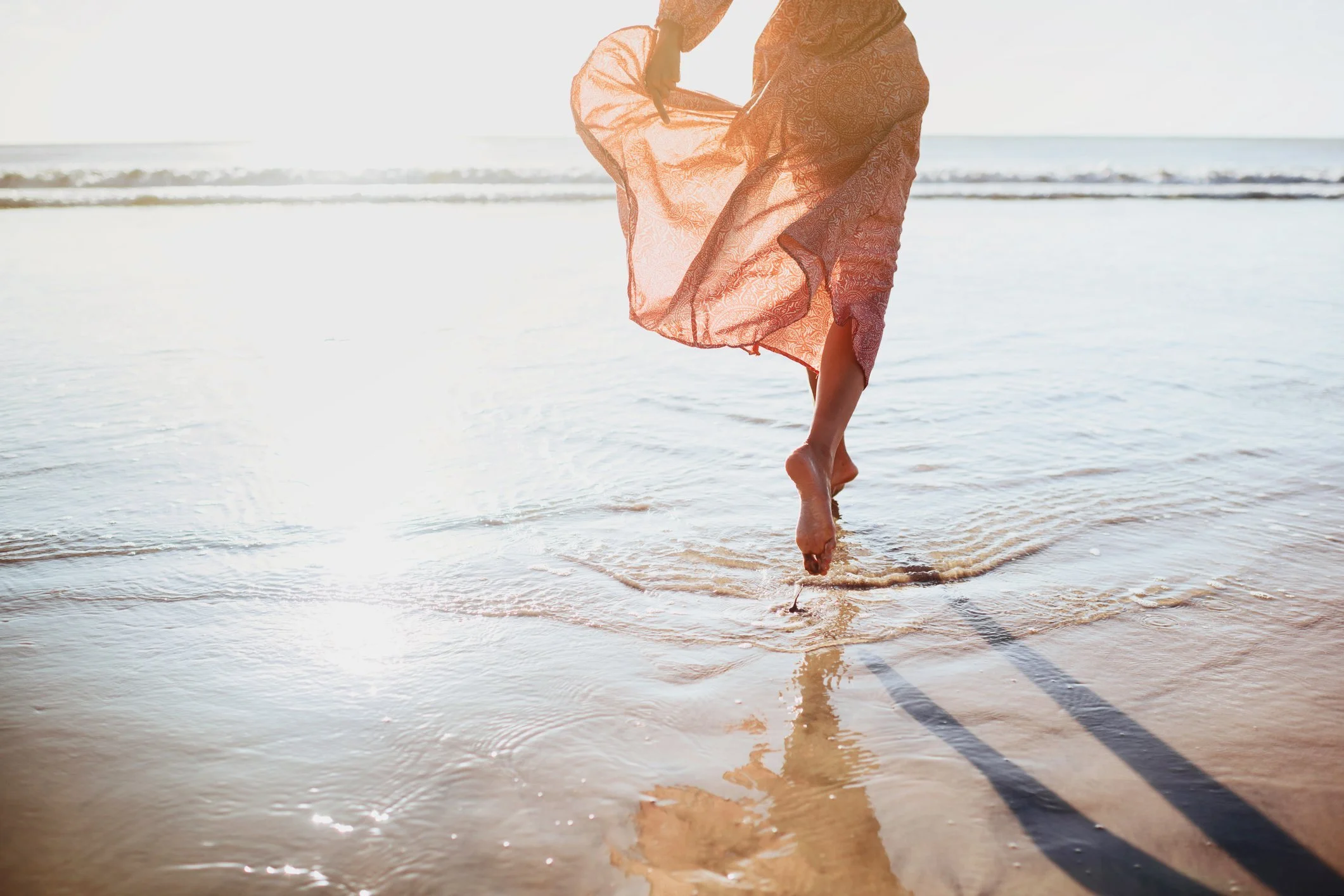 Running on the beach, experiencing joy and connection through retreats and events by Sound Space Australia. Offering sound meditation, sound healing, and other wellness activities across Canberra, ACT, NSW, and additional locations.