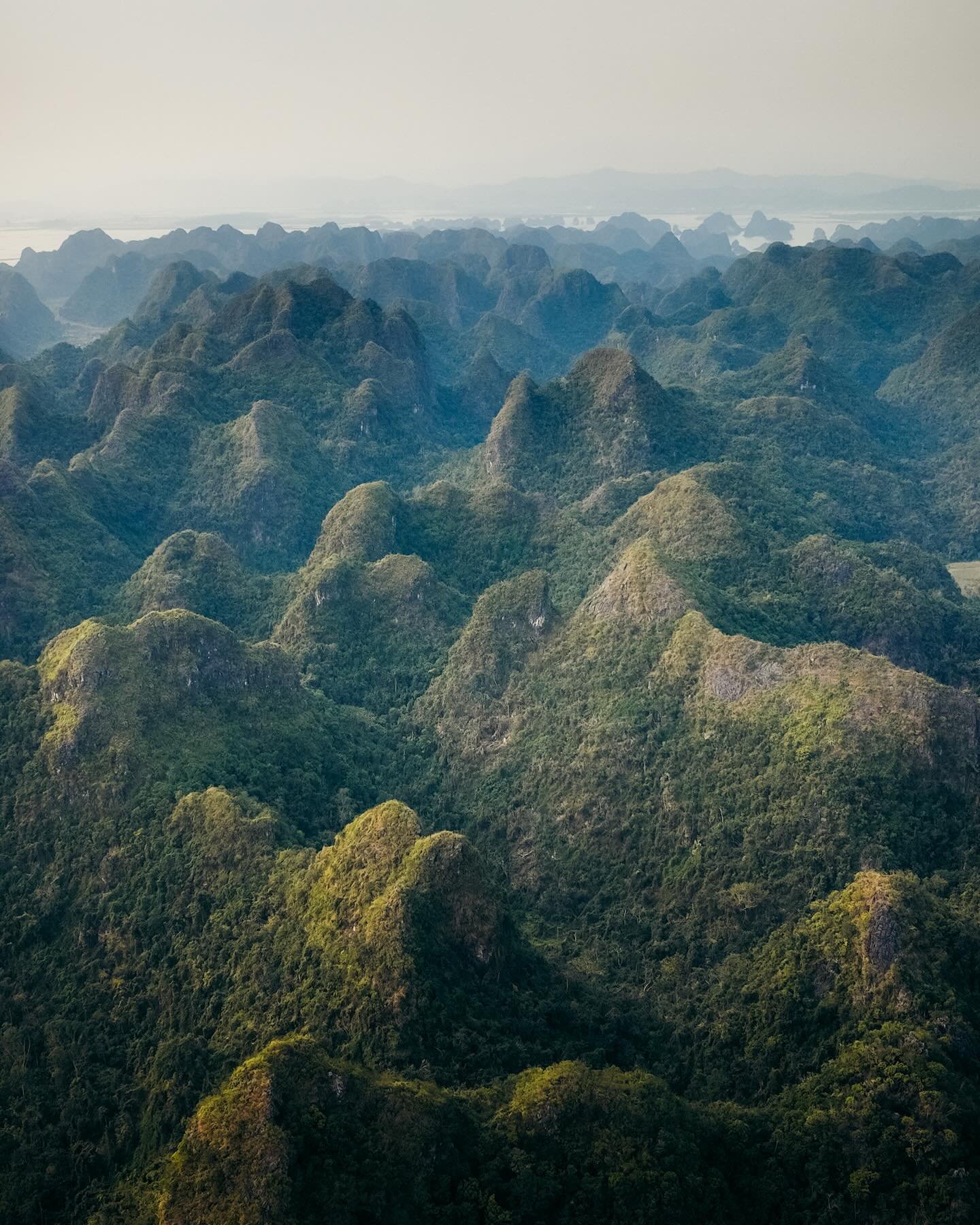 After exploring the cities and urban lifestyle of Vietnam, we begin to head further North. Taking a few days to explore Cat Ba Island and its rural landscape.
These images are taken from the Ngu Lam Peak, the highest point on Cat Ba Island. Offerin