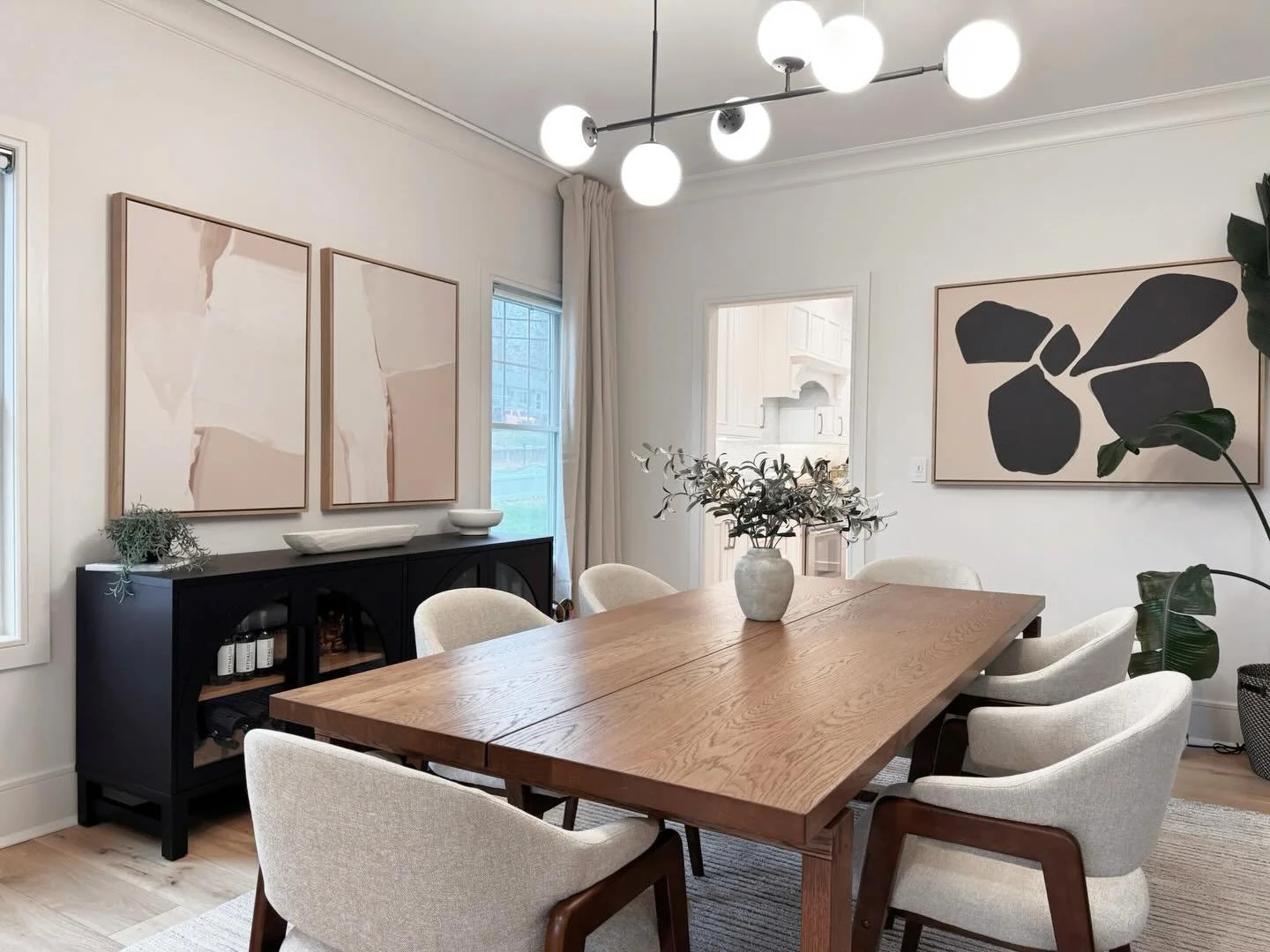Letting the art lead the room 🖼️ 
These pieces by @greenliliart set the tone for the space, bringing balance and quiet movement to the dining area

#interiordesign #homedecor #interiordesigner #diningroom