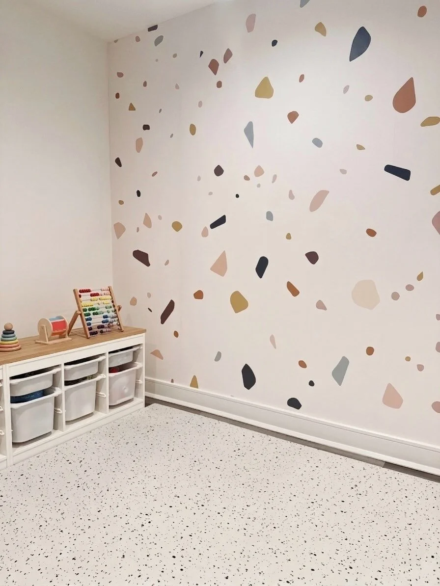 Wrapping up the Quiet Oak project today with the feature wall in the playroom, featuring this gorgeous terrazzo print wallpaper from @munksandme! Swipe to see the before!