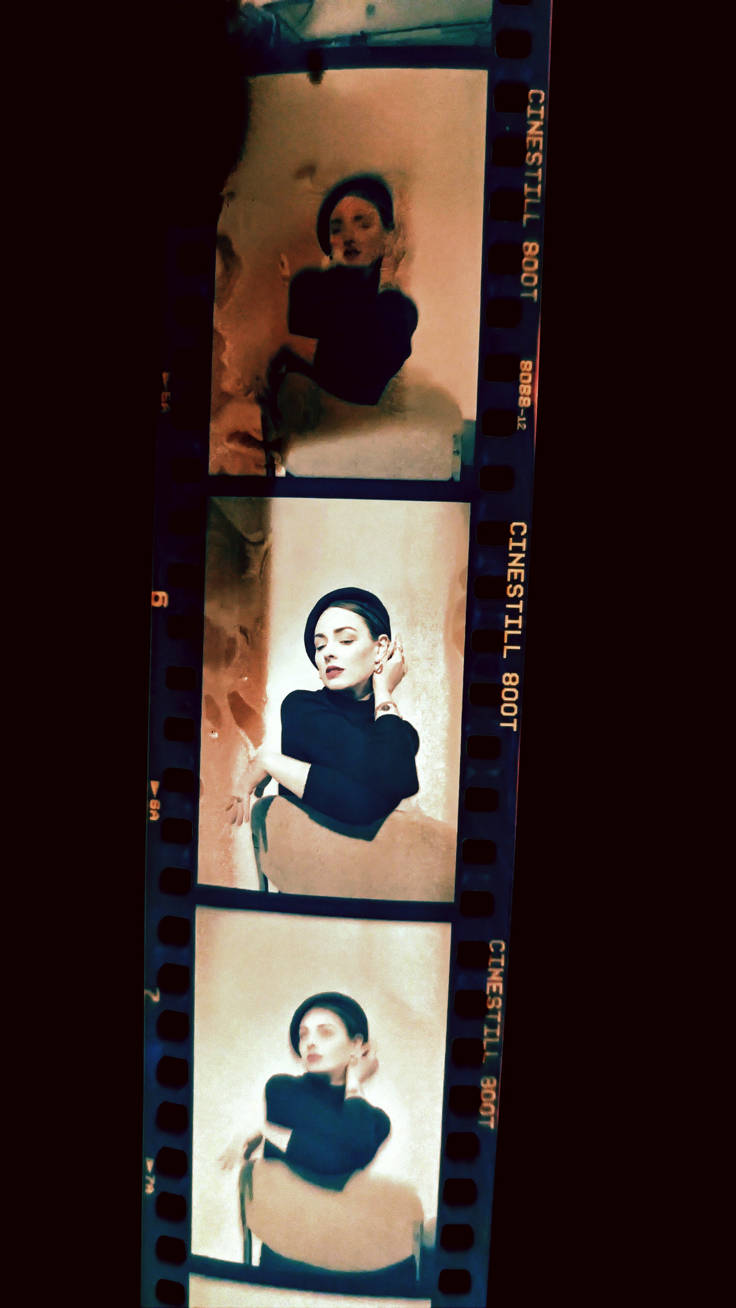Three vintage-style photo booth pictures of a woman in a black top, sitting on a chair, with different poses and expressions.