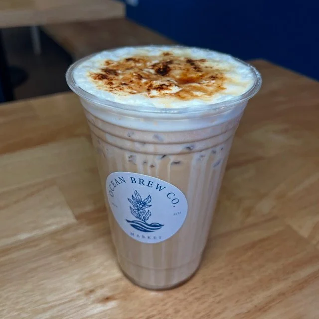 Creamy iced latte with foam at Ocean Brew Co in Ocean Township NJ