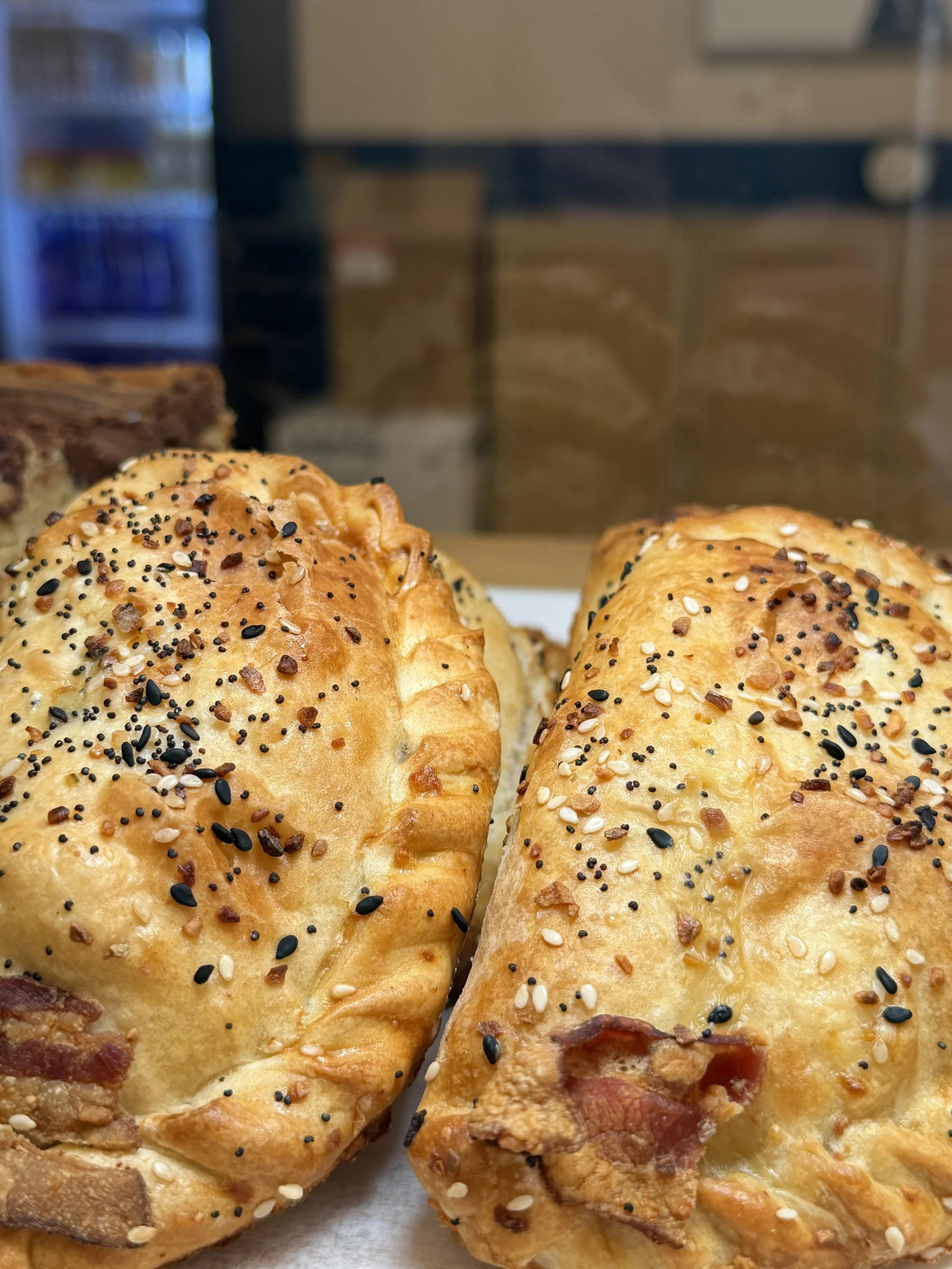 Freshly baked savory stuffed pastries at Ocean Brew Co bakery