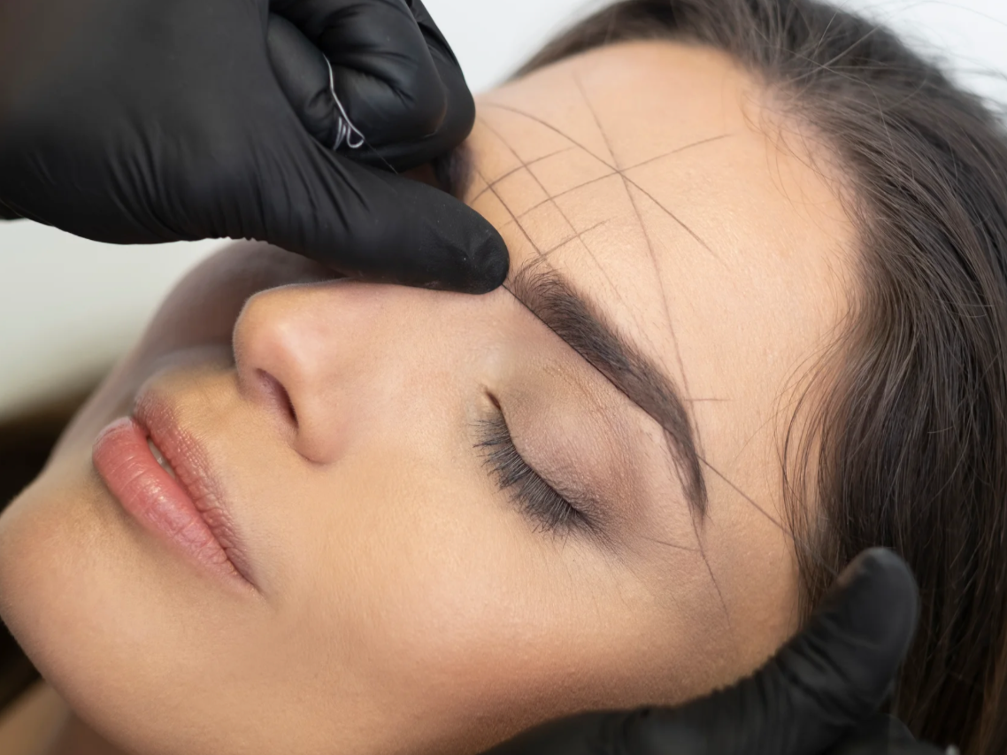 Professional makeup application using mineral cosmetics at Calgary skin clinic.