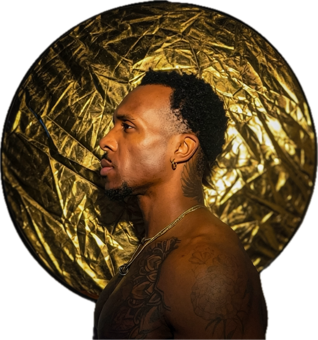 Zeek Burse profile image, standing in front of a gold metallic circle.