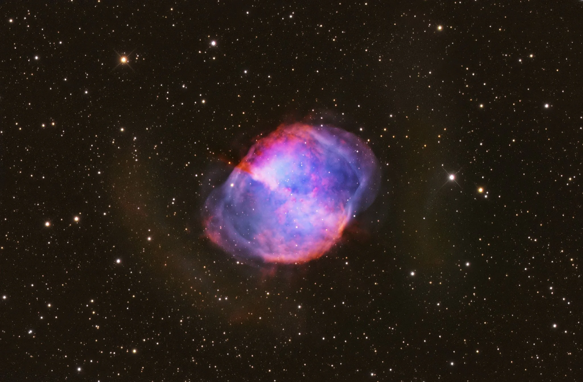 The Dumbbell Nebula at the hydrogen and oxygen wavelengths