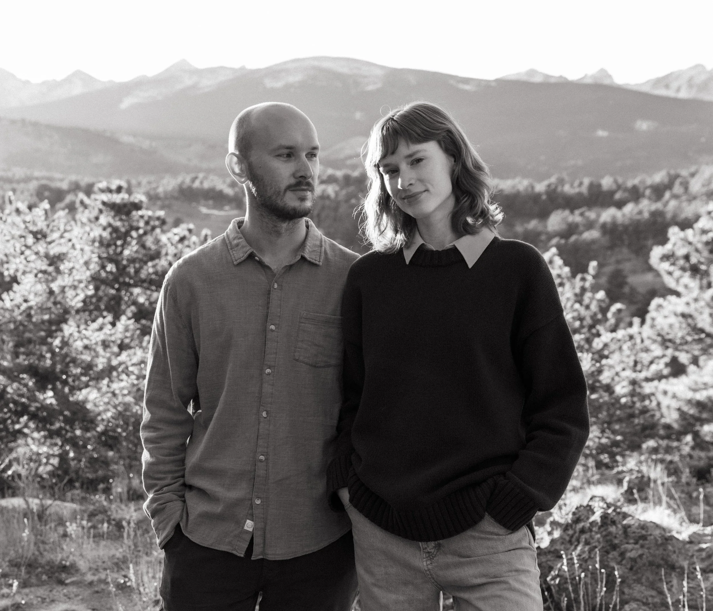 Husband and Wife Wedding Photographers in Black and White in Mountain Scenery