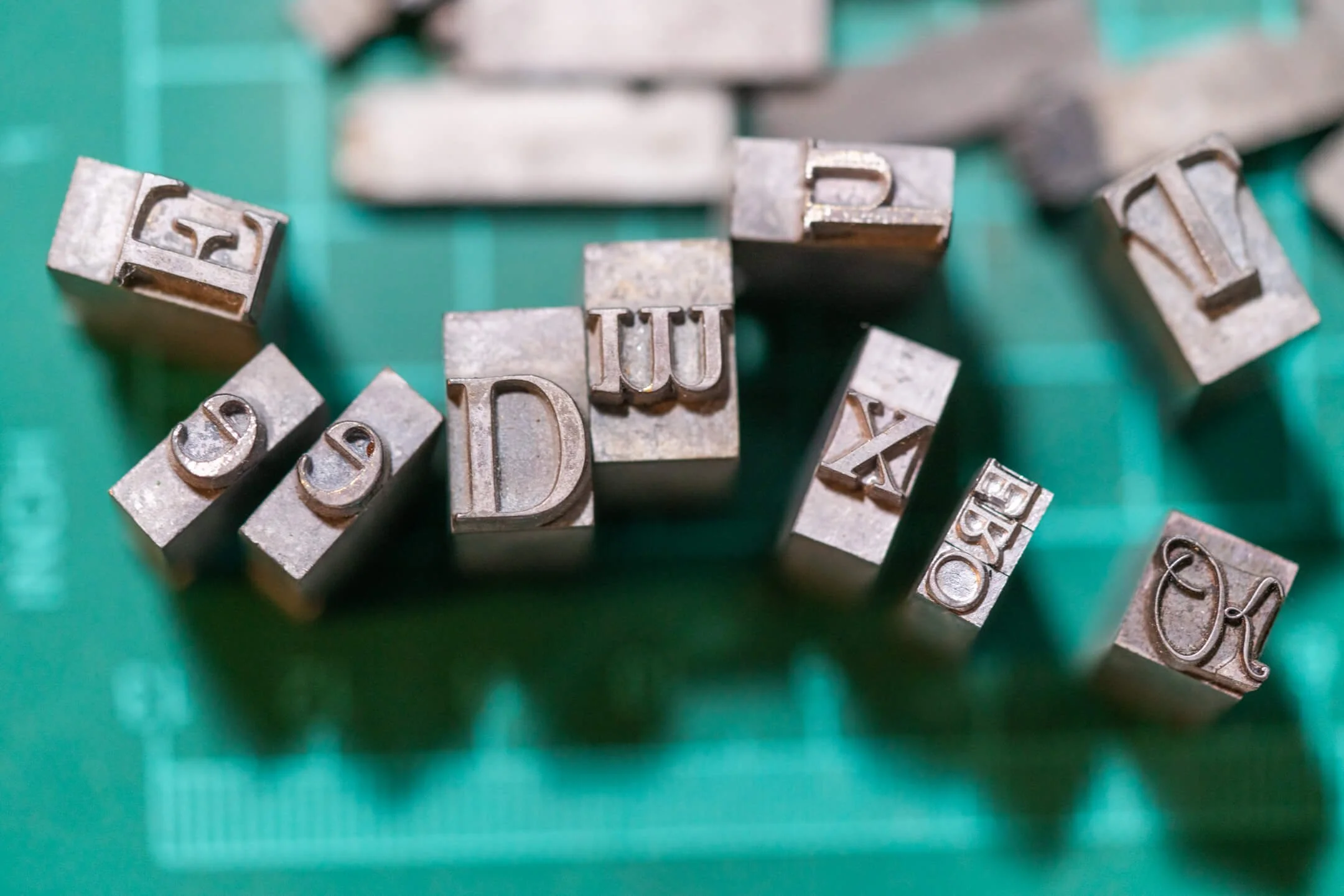 Metal typset letters