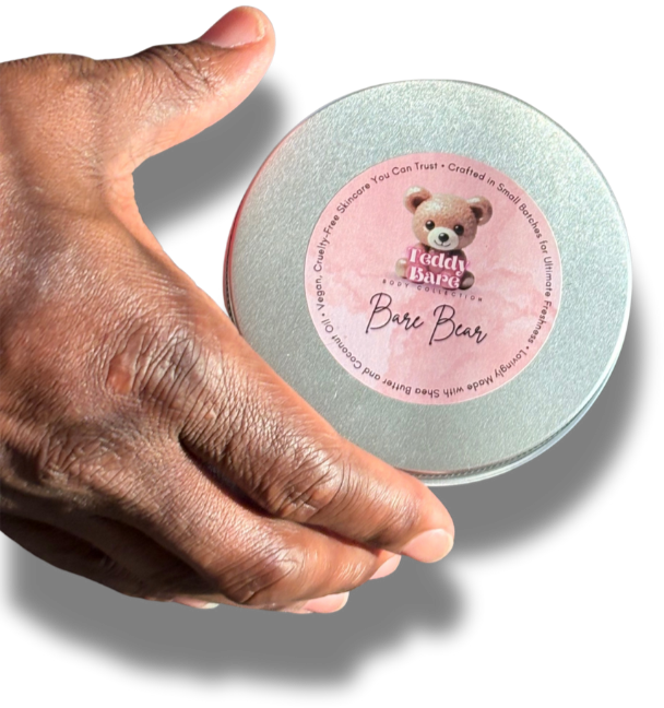Hand reaching for Bare Bear body butter tin by Teddy Bare Body, unscented skincare designed for gentle moisturizing and sensitive skin.
