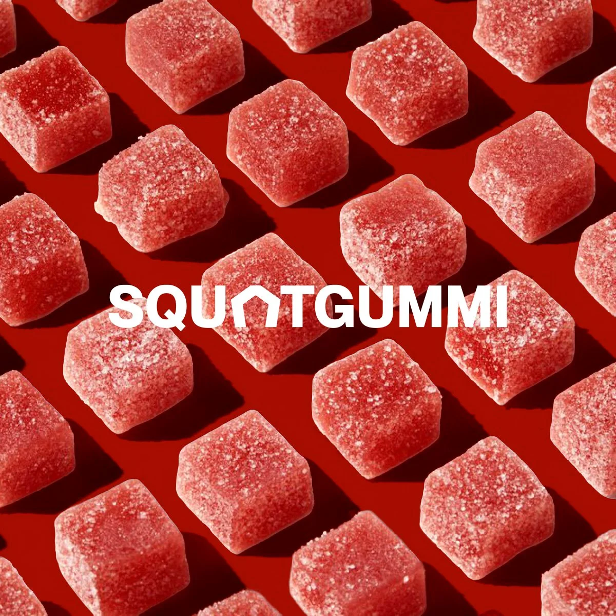 Multiple red sugar-coated gummy candies arranged in a grid pattern with shadows, and the word 'SQUATGUMMI' in bold white letters overlaying the candies.