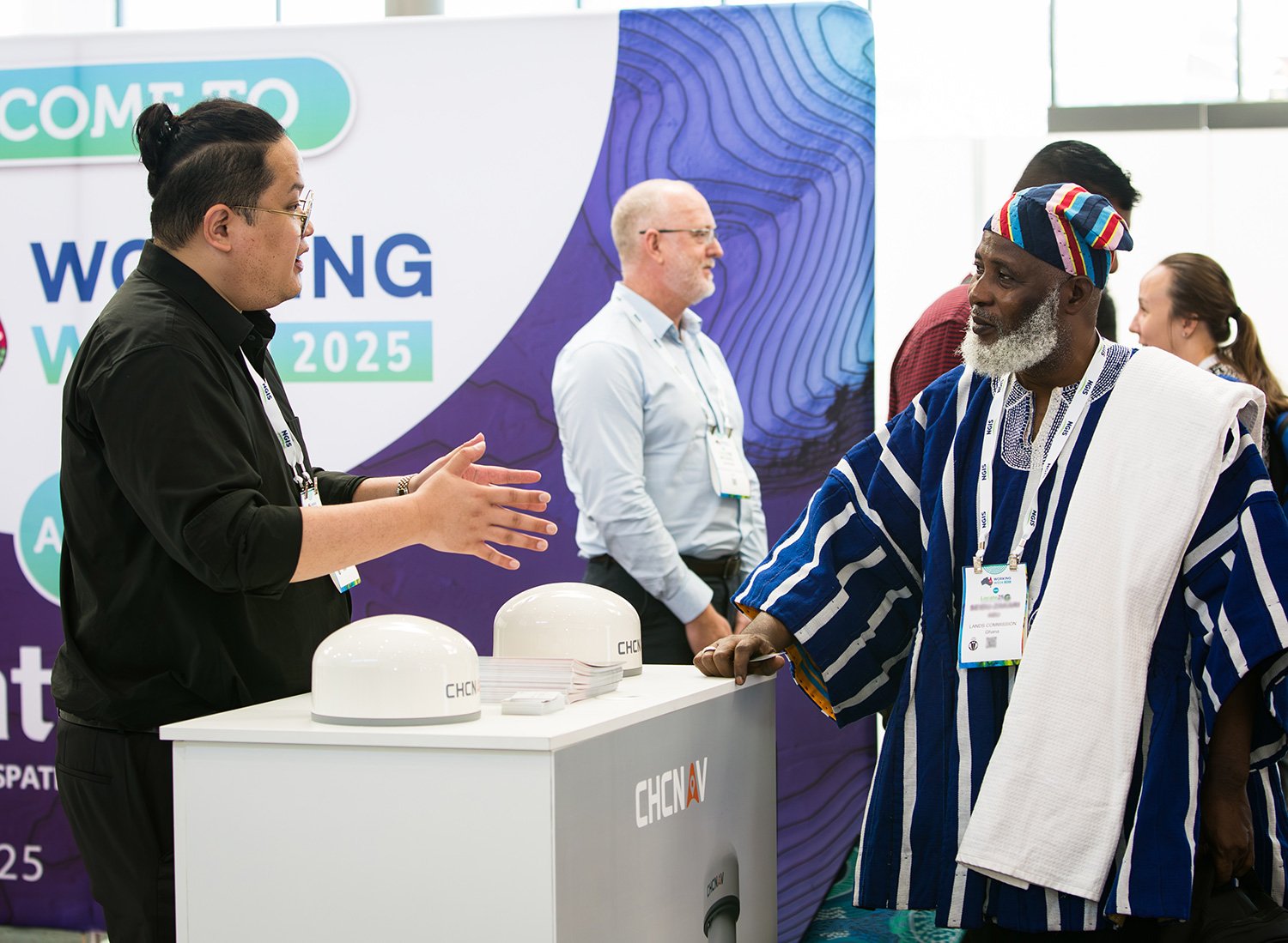 Expo exhibitor talking with attendee a BCEC conference