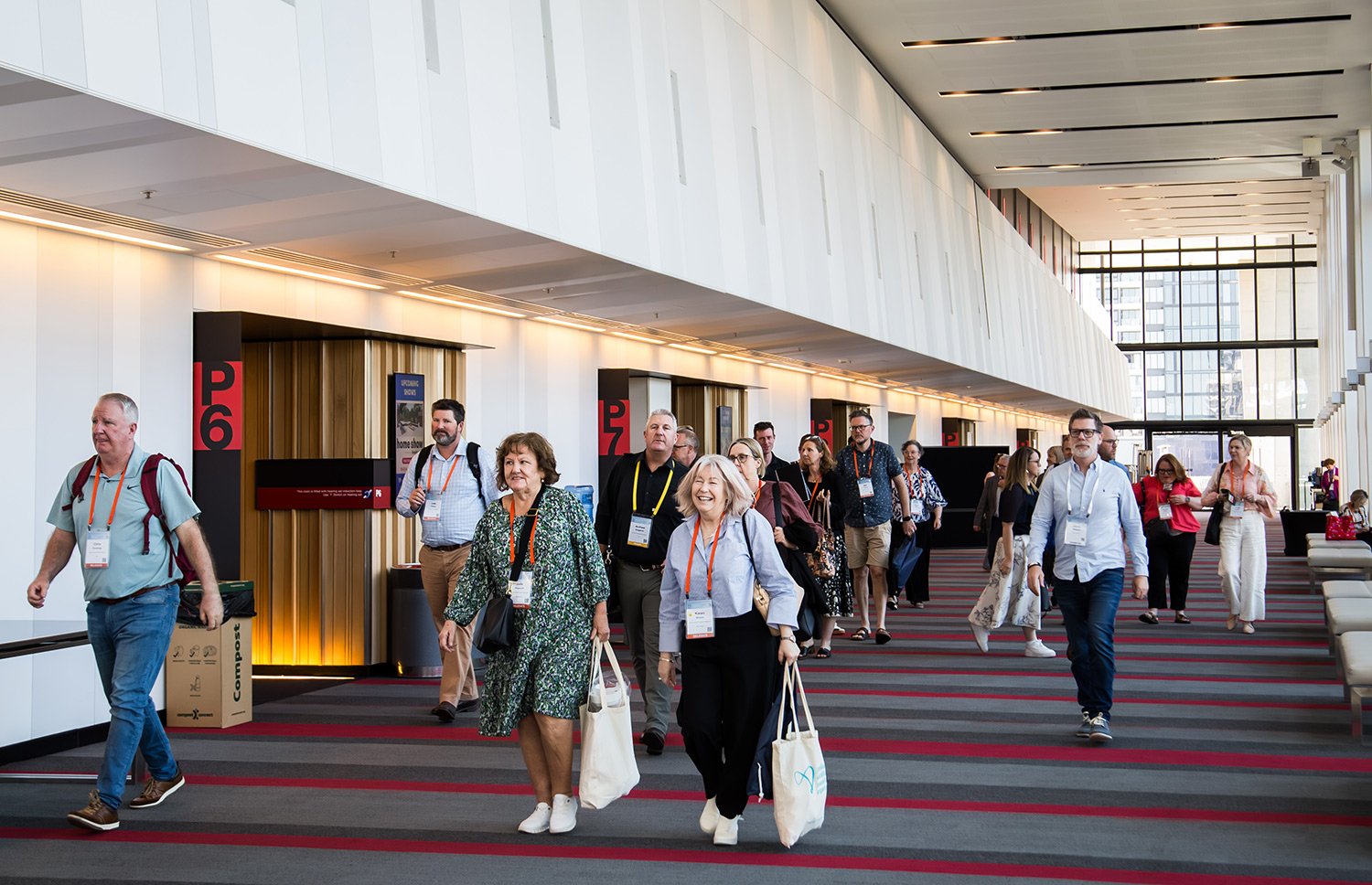 Conference delegates walking at BCEC