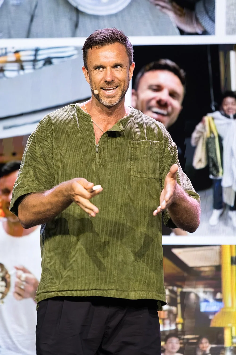 Keynote speaker delivering presentation on stage