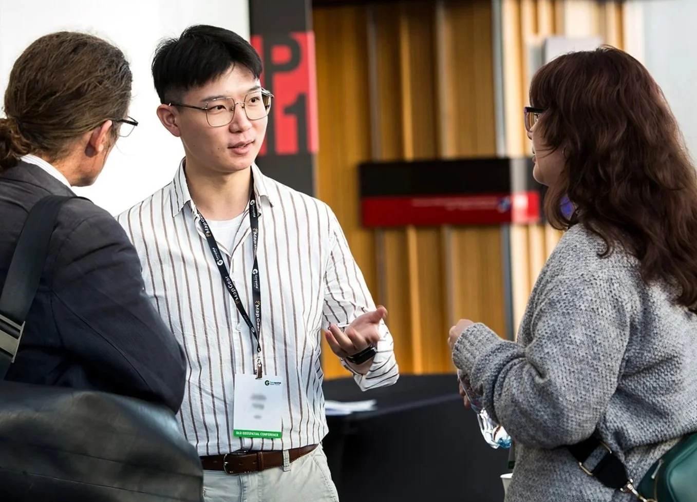 Conference delegates enjoying networking break at Brisbane Convention and Exhibition Centre