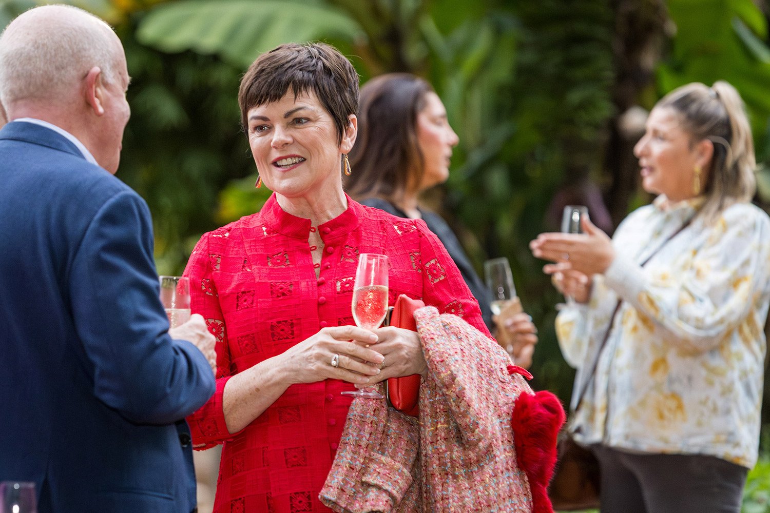 Guests enjoying drinks and conversation in the garden at the Makers & Creators Dinner at Brookfield Gardens.