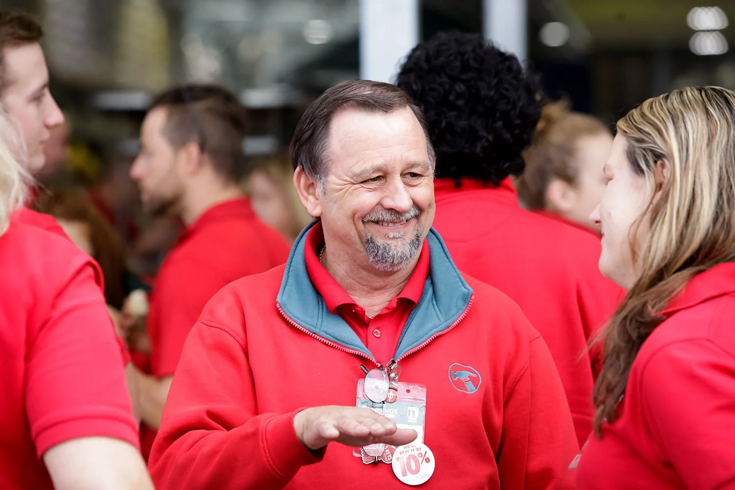 Staff interaction during store opening event
