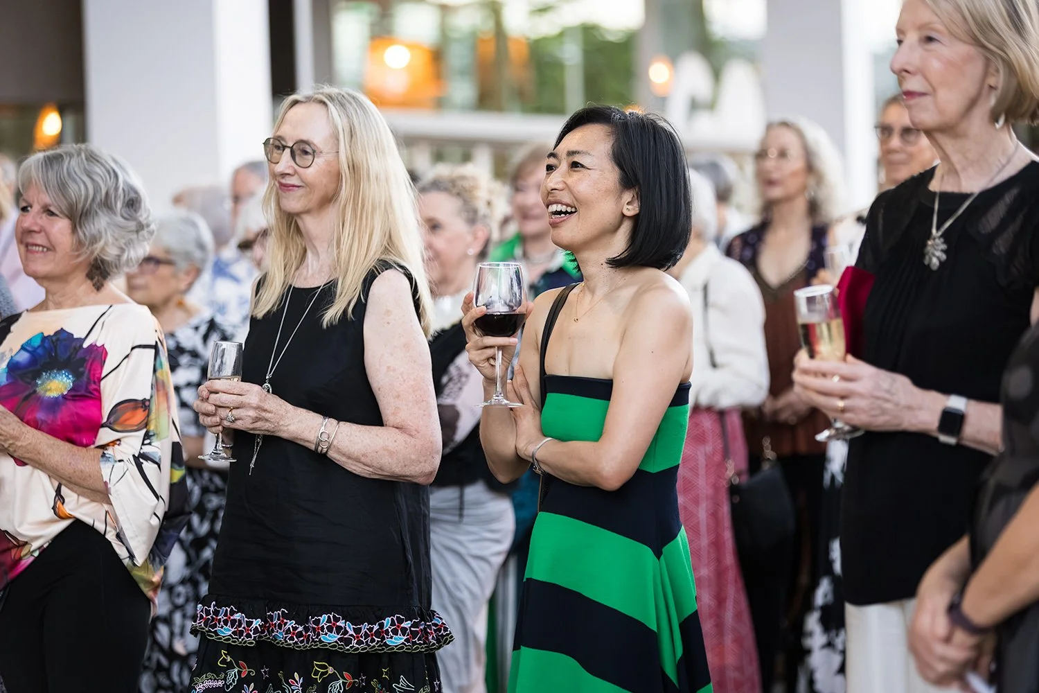 Afternoon event audience laugh during a fun moment at a Brisbane city event