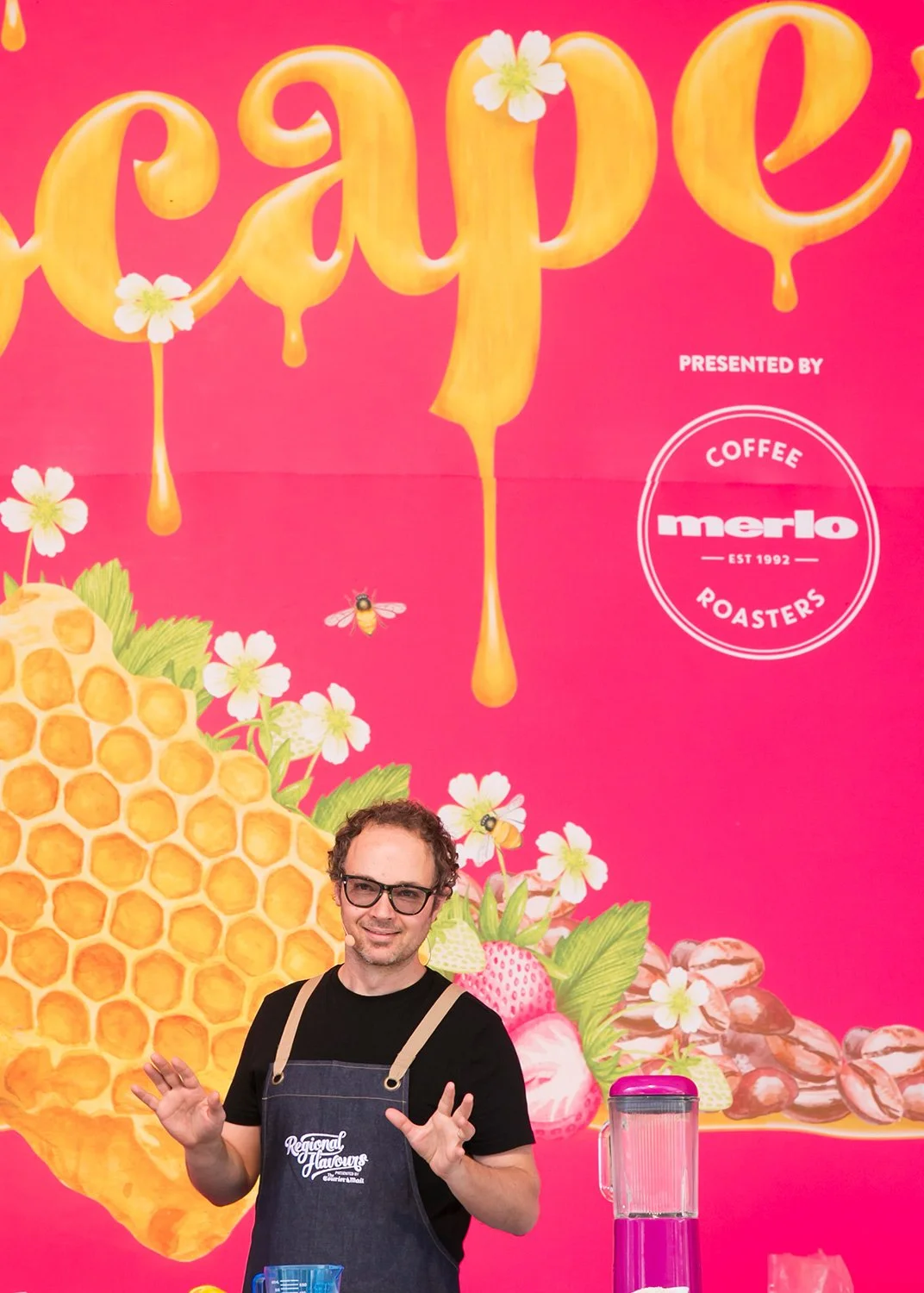 Celebrity chef on stage at sponsored public event