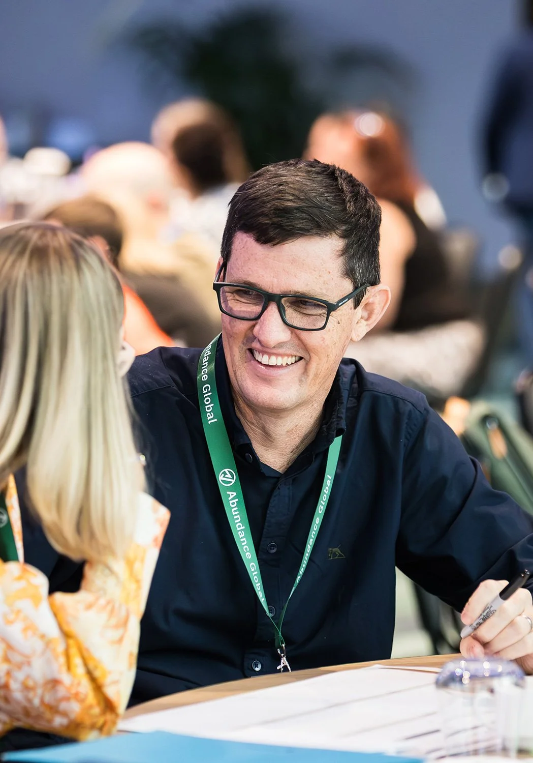 Happy conference guests in conversation at their table at The Star Brisbane