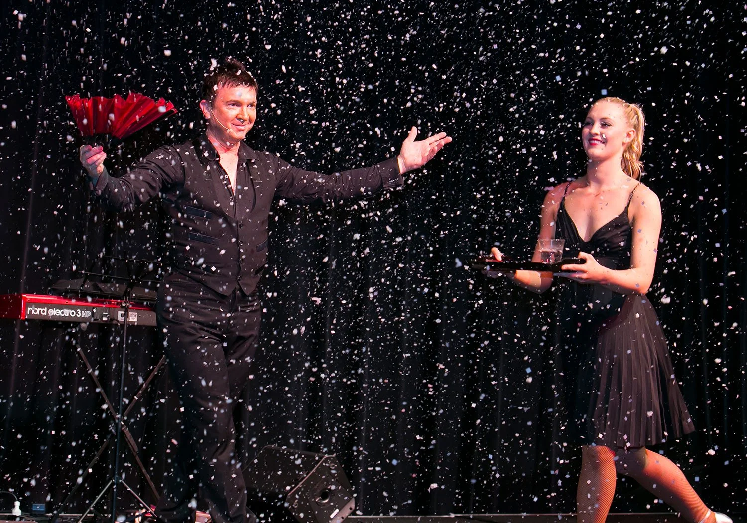 Magician performing on stage at BCEC gala dinner