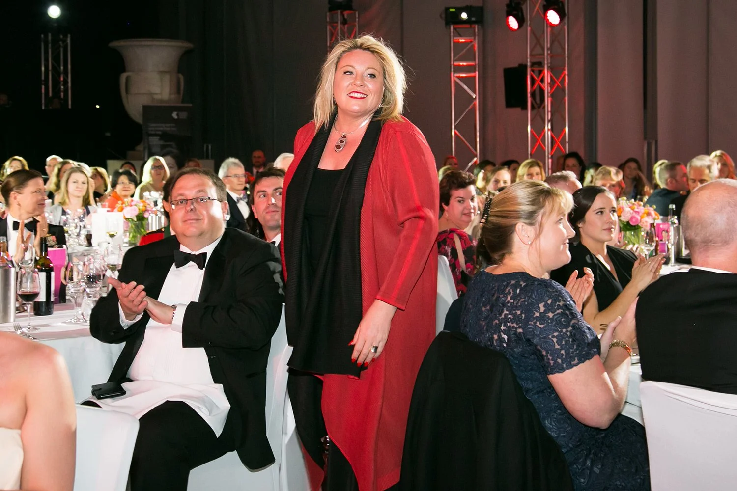 Award winner approaching stage at Brisbane awards night