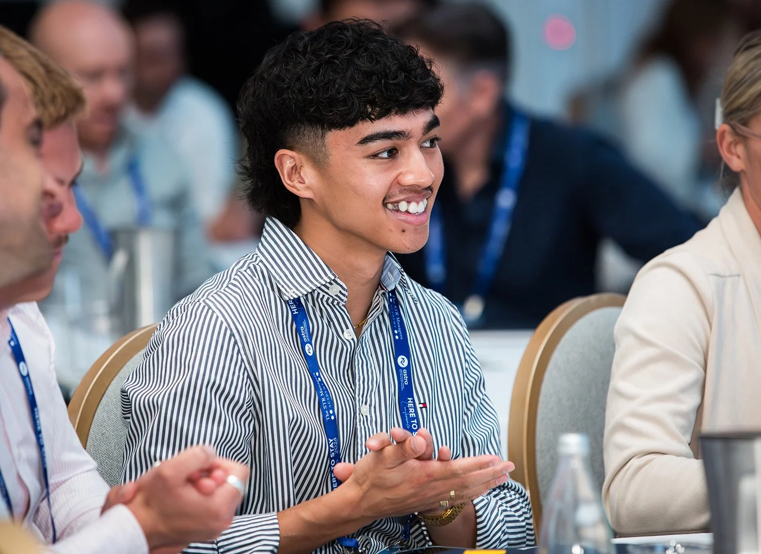 Audience applauding at a Brisbane Sofitel Central corporate summit