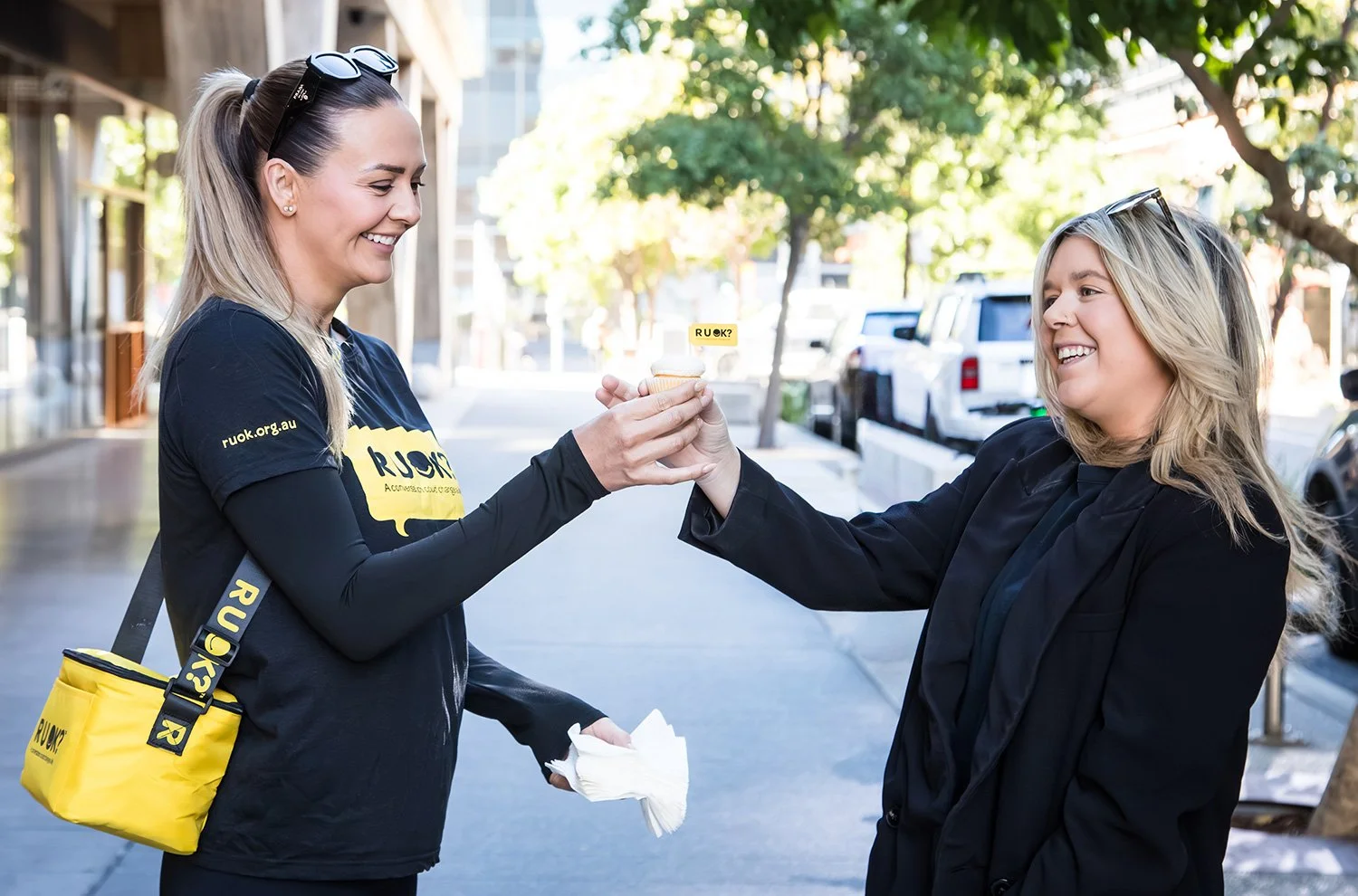 Branded cupcake distribution at R U OK? Day event