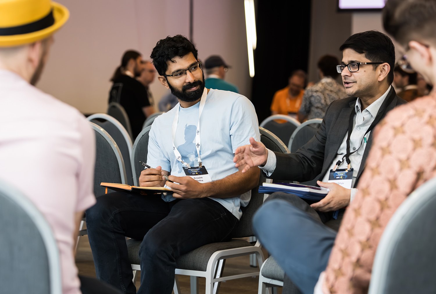 Conference attendees having a group discussion at BCEC