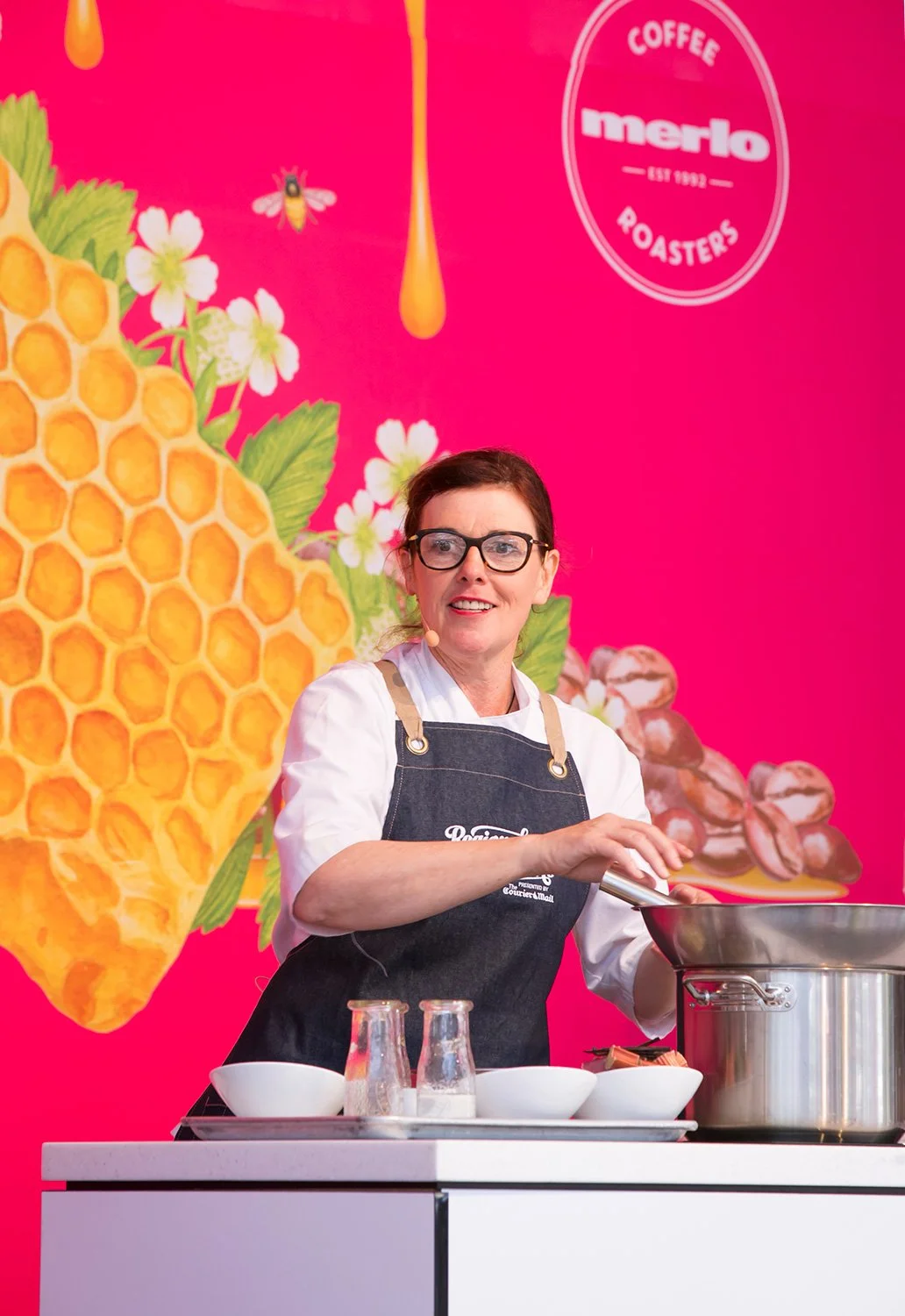 Guest chef cooking on stage at activation event