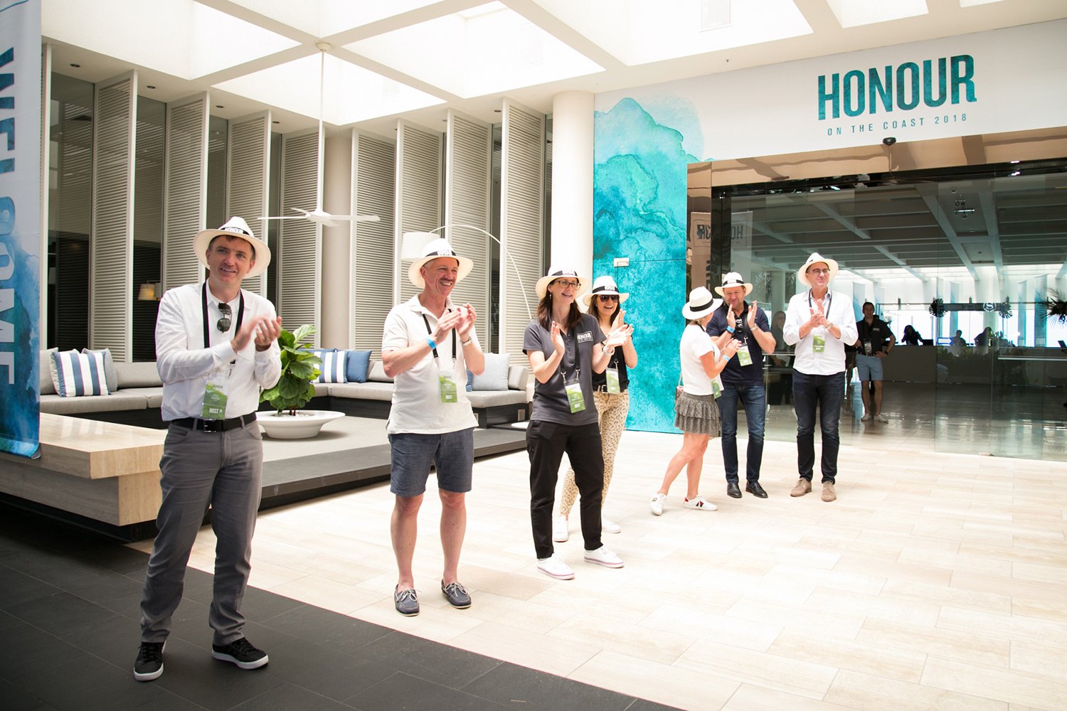 Conference hosts stand ready to greet attendees at Gold Coast conference
