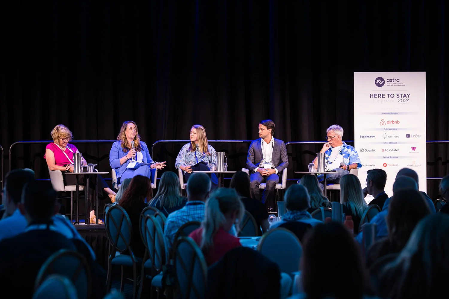 Panel members sharing insights at a Brisbane Sofitel Central industry event