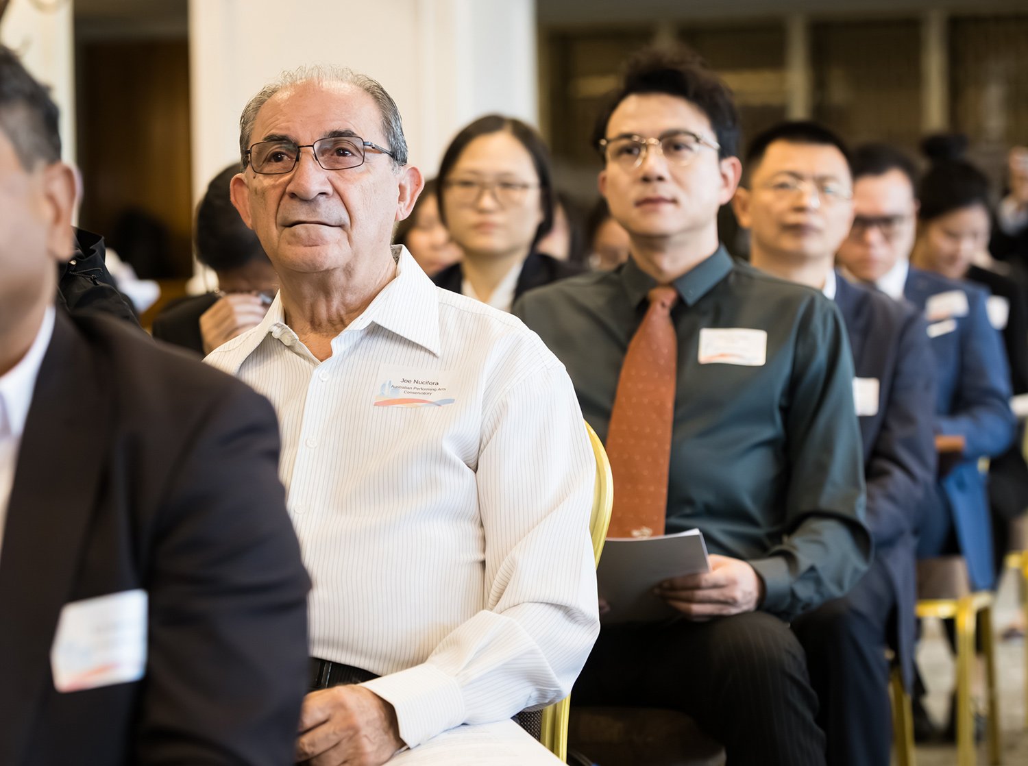 Audience listening intently at a Brisbane industry event