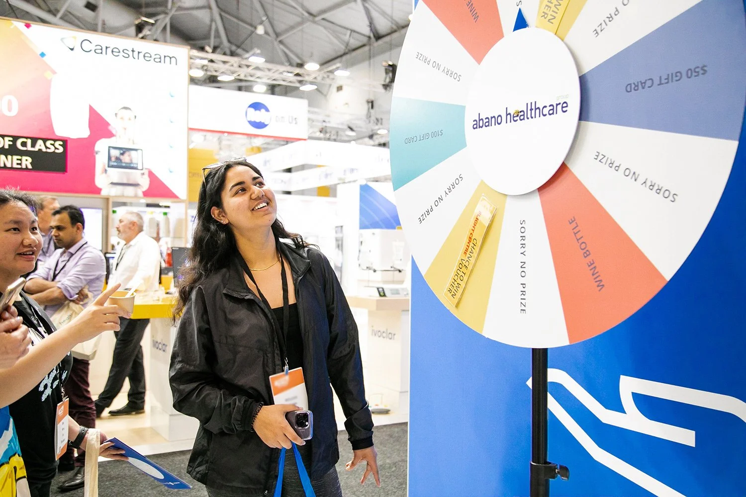 Expo attendees play a prize wheel at BCEC