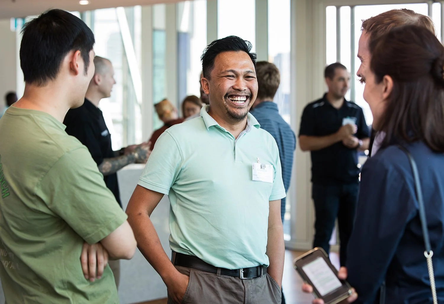 Networking and conversation during a coffee break at Brisbane conference