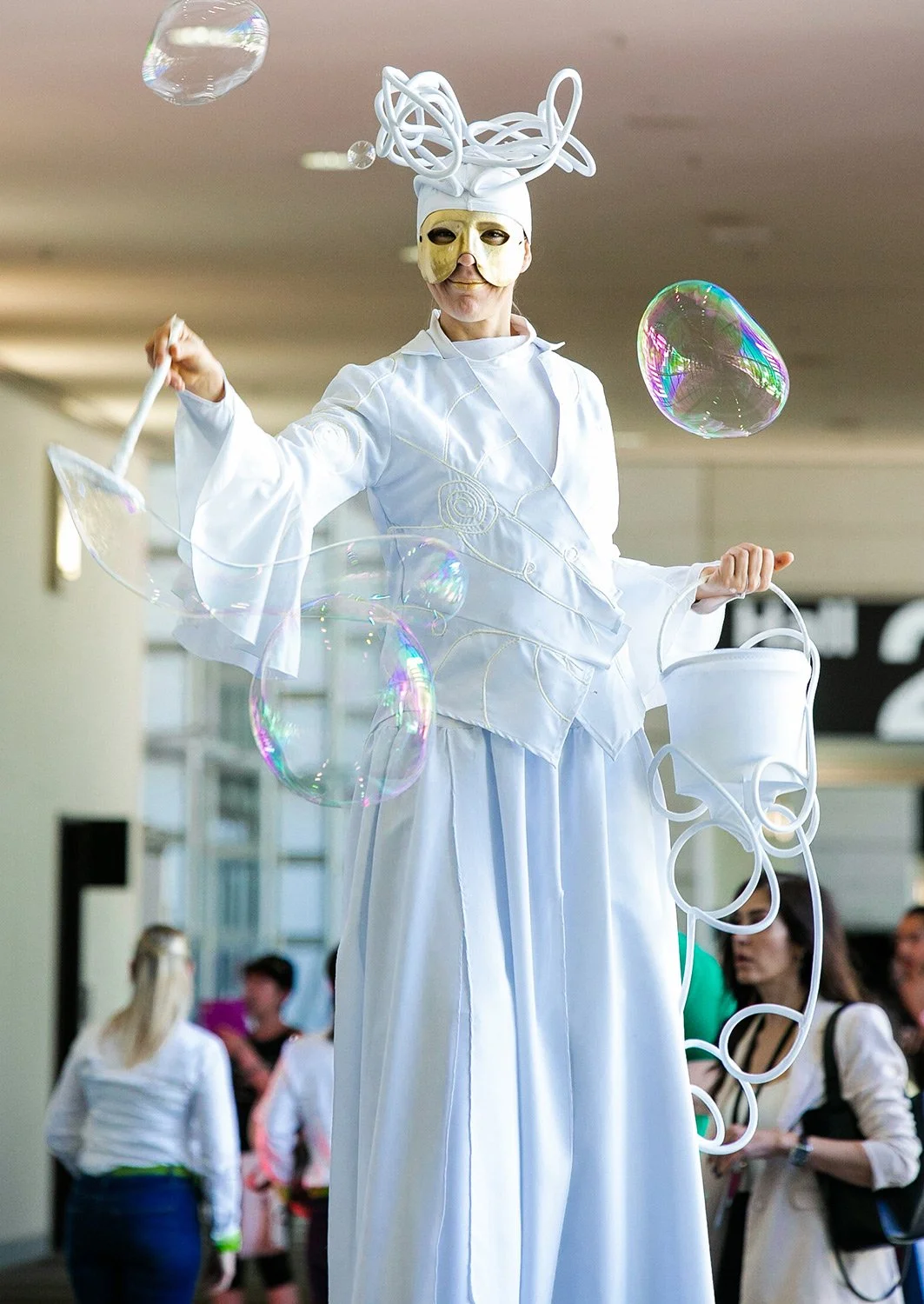 Entertainer on stilts in BCEC exhibition halls foyer