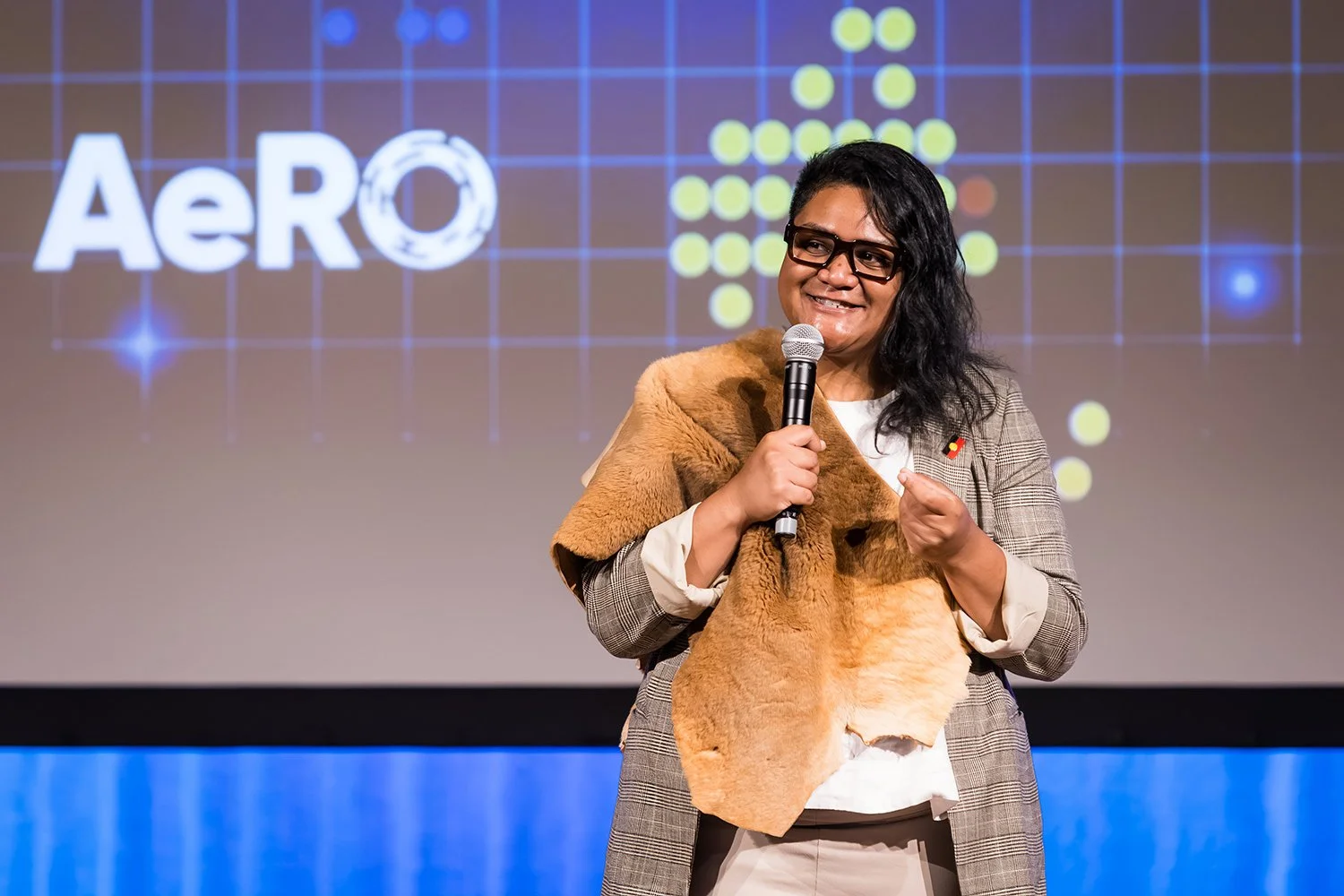 Indigenous leader performs a Welcome to Country ceremony at a Brisbane conference