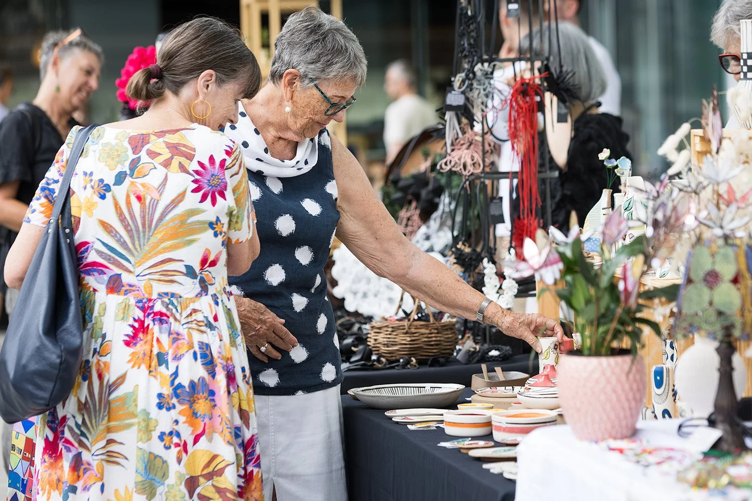 Customers viewing local design market products