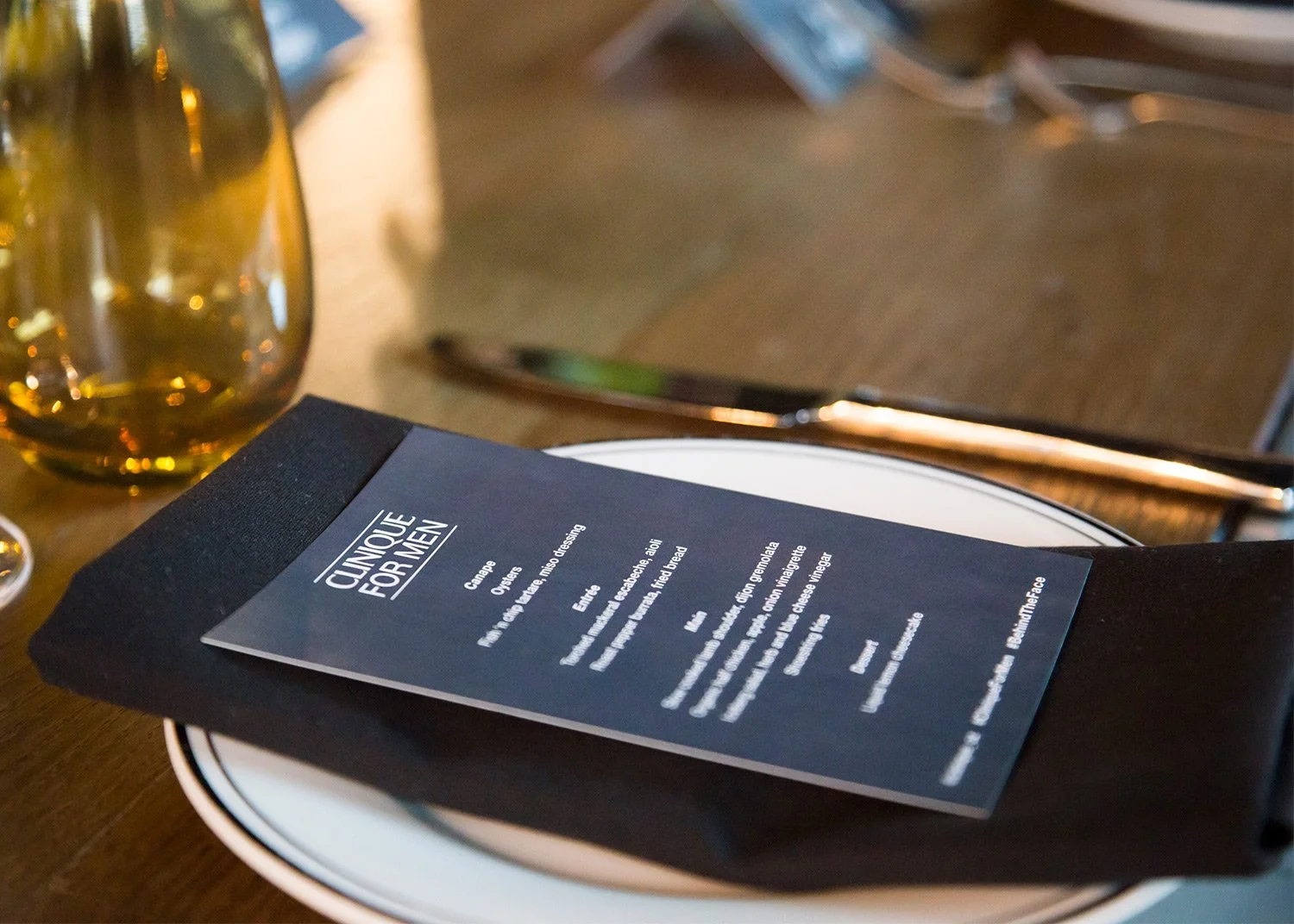 Close-up of branded menu at activation event